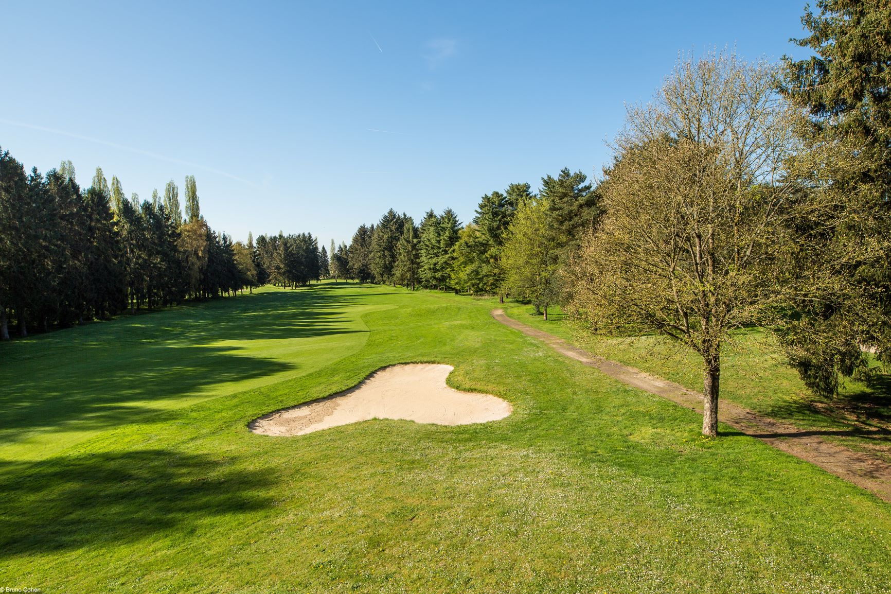Tree-lined fairways at Apremont Golf Club, around Paris, France