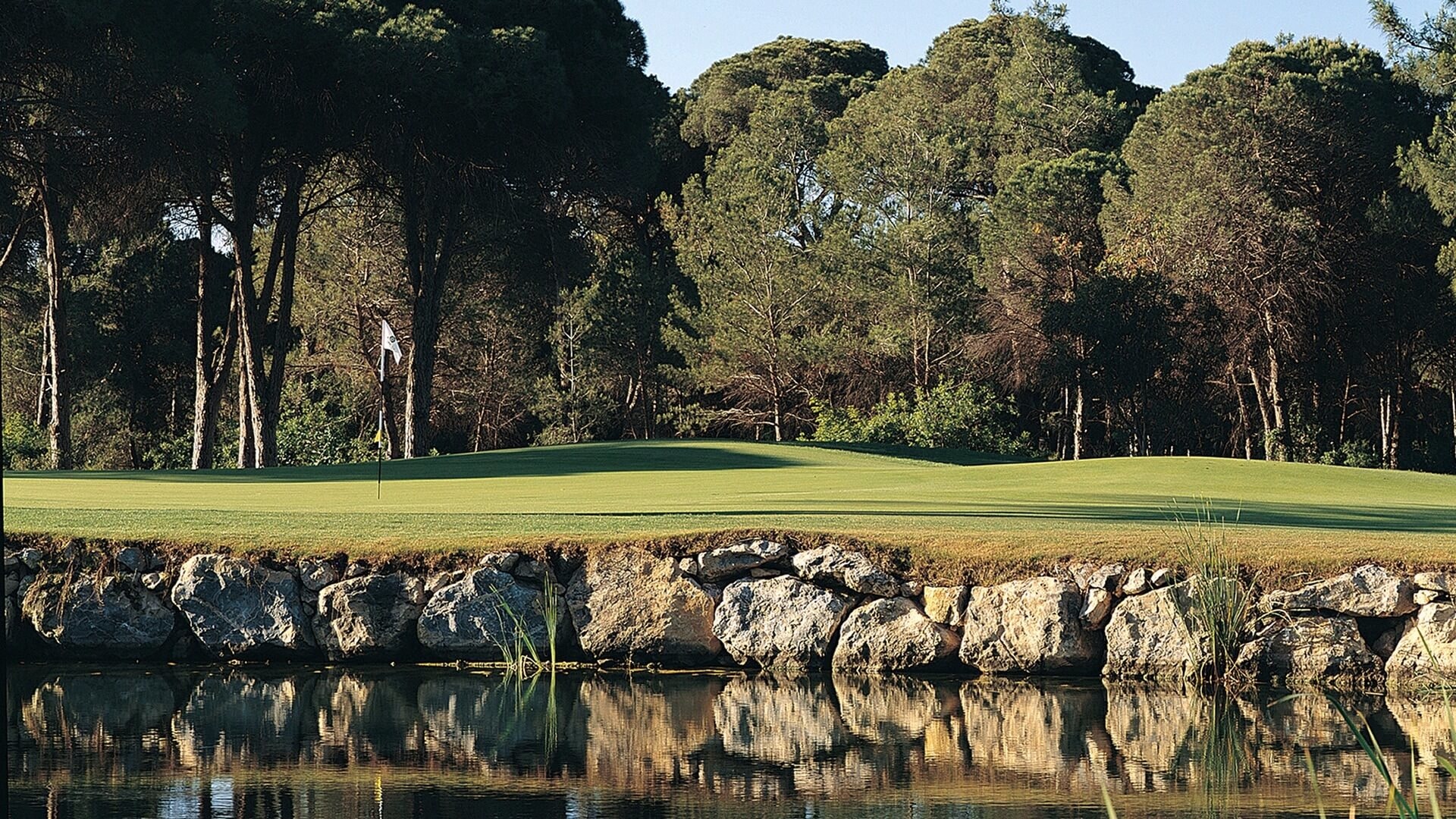 Reflections on the water at Cornelia Faldo golf course, Belek, Turkey