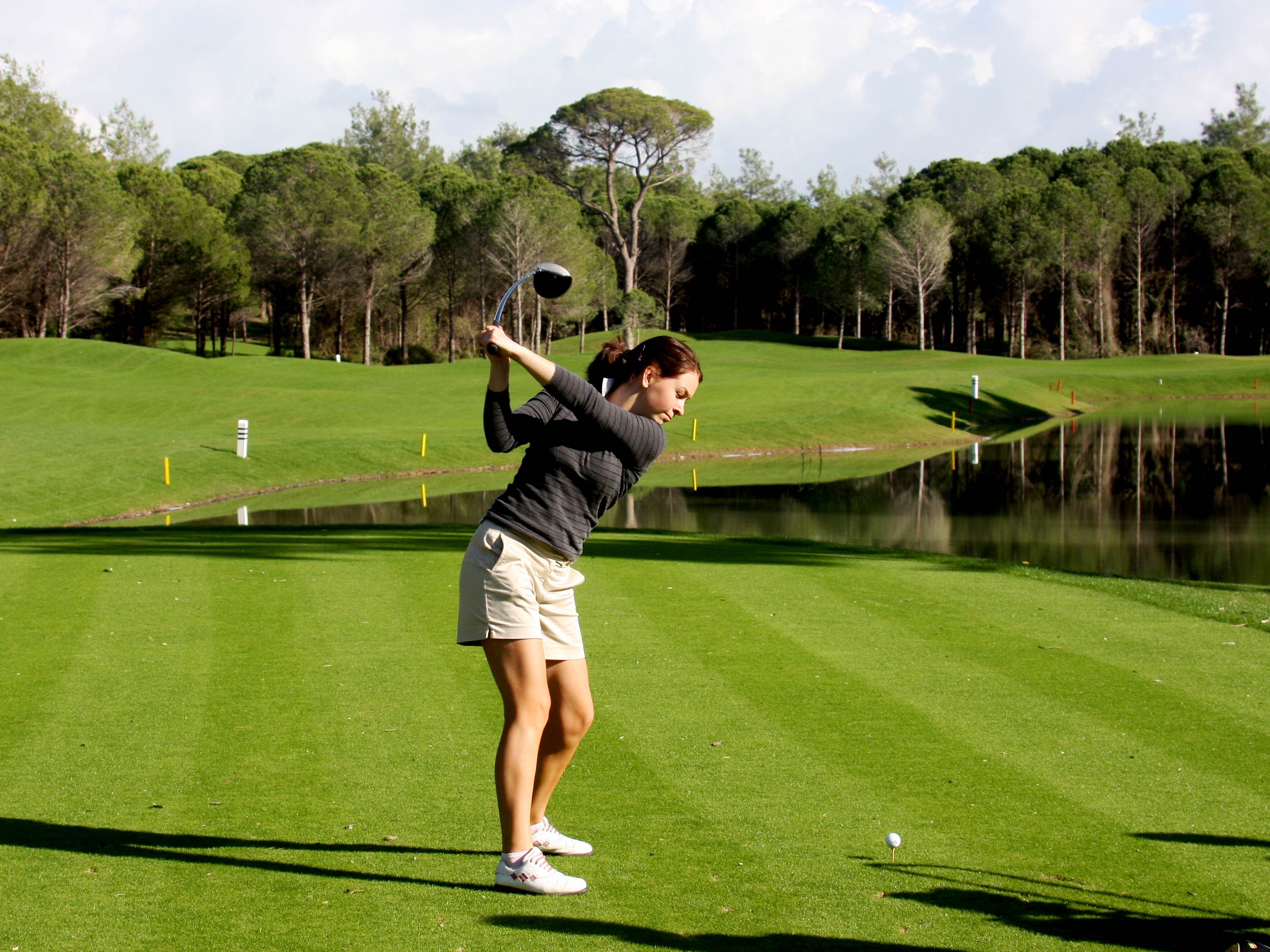Driving off on Sueno Dunes golf course, Belek, Turkey