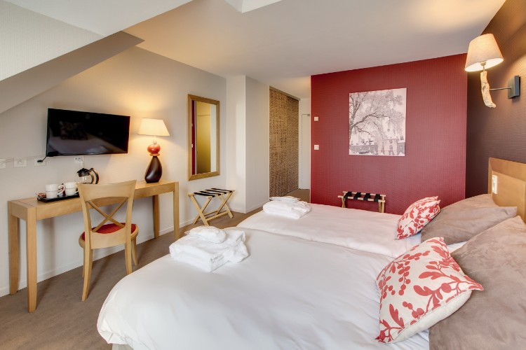 A large double room at Domaine des Ormes, near St Malo, Brittany, France. Golf Planet Holidays.