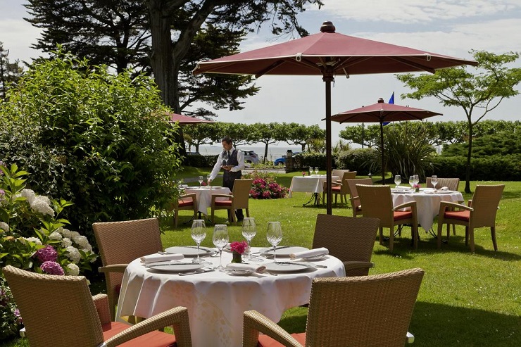 Dining in the garden at Relais et Chateaux Castel Marie Louise, La Baule, Brittany, France