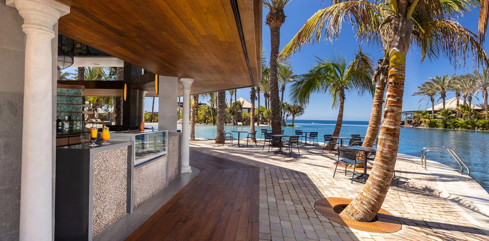 Enjoy a drink at the pool bar at Lopesan Costa Meloneras, Gran Canaria, Canary Islands