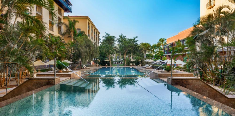 Relax by the swimming pool at Lopesan Costa Meloneras, Gran Canaria