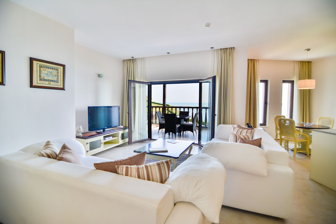 Large lounge and balcony in a suite at Thracian Cliffs Golf Resort and Spa, Cape Kaliakra, Bulgaria