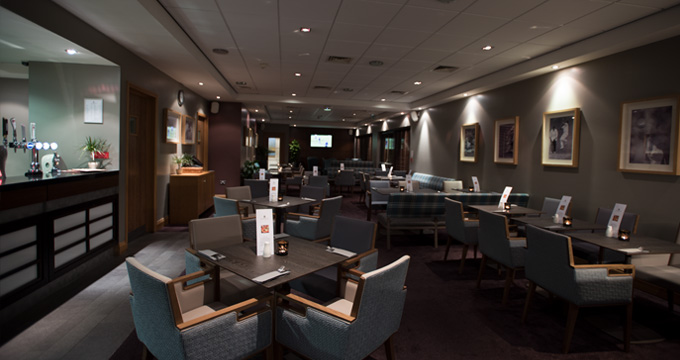 Enjoy a drink in the bar at The Warwickshire Golf and Country Club, England