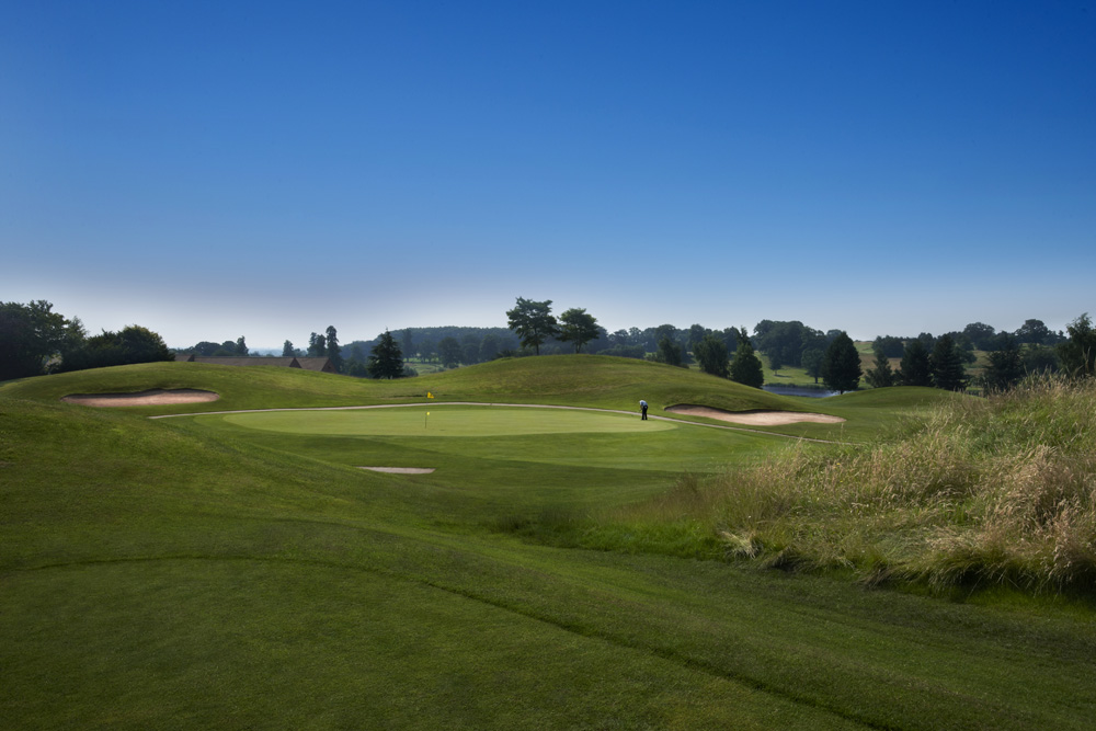 Putting to the flag on the King's Course at The Warwickshire Golf Club, England