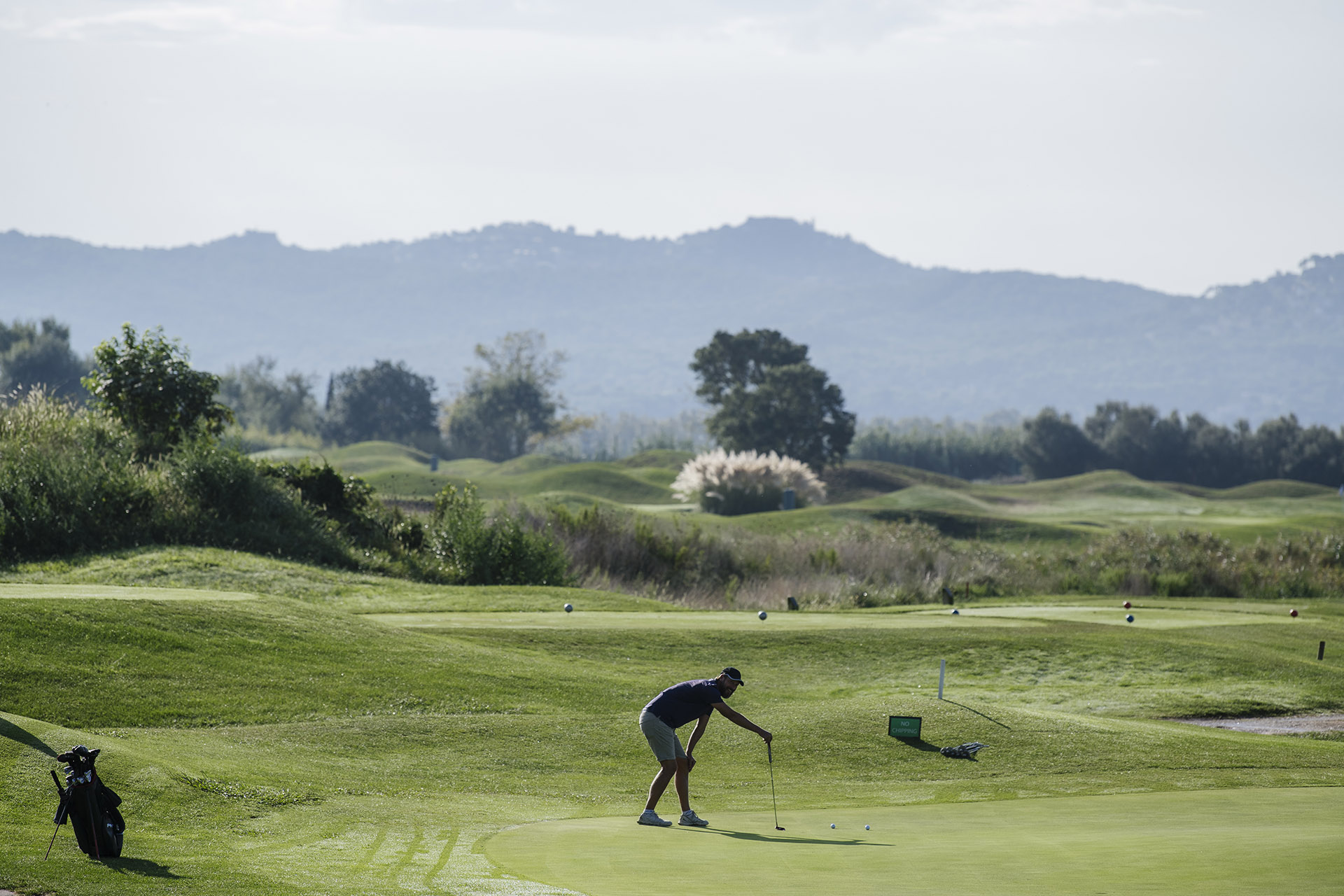 Lining up your golf shot on the third hole at Emporda Links and Forest, Girona, Costa Brava, Spain Girona