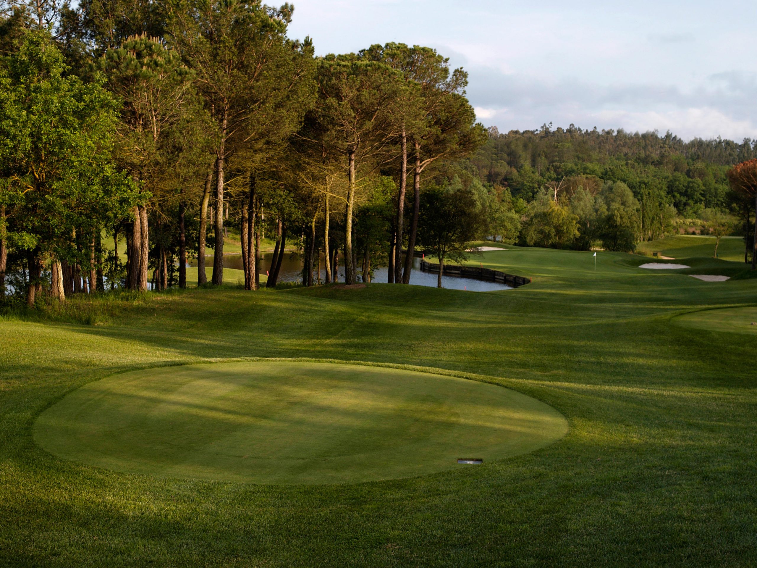 Bunkers to the right and water to the left on this par three at PGA Catalunya Golf Resort, Costa Brava, Spain