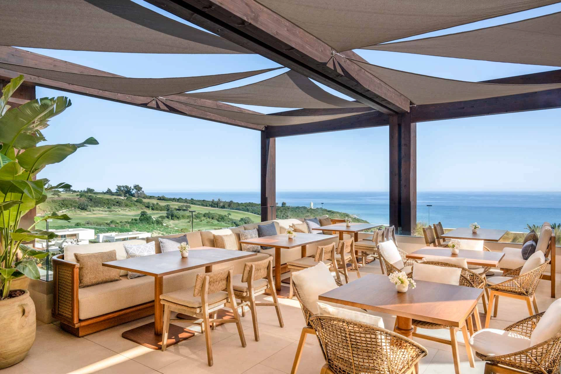 On the terrace at Fairmont La Hacienda overlooking Hacienda golf club, Costa del Sol, Spain. Golf Planet Holidays.