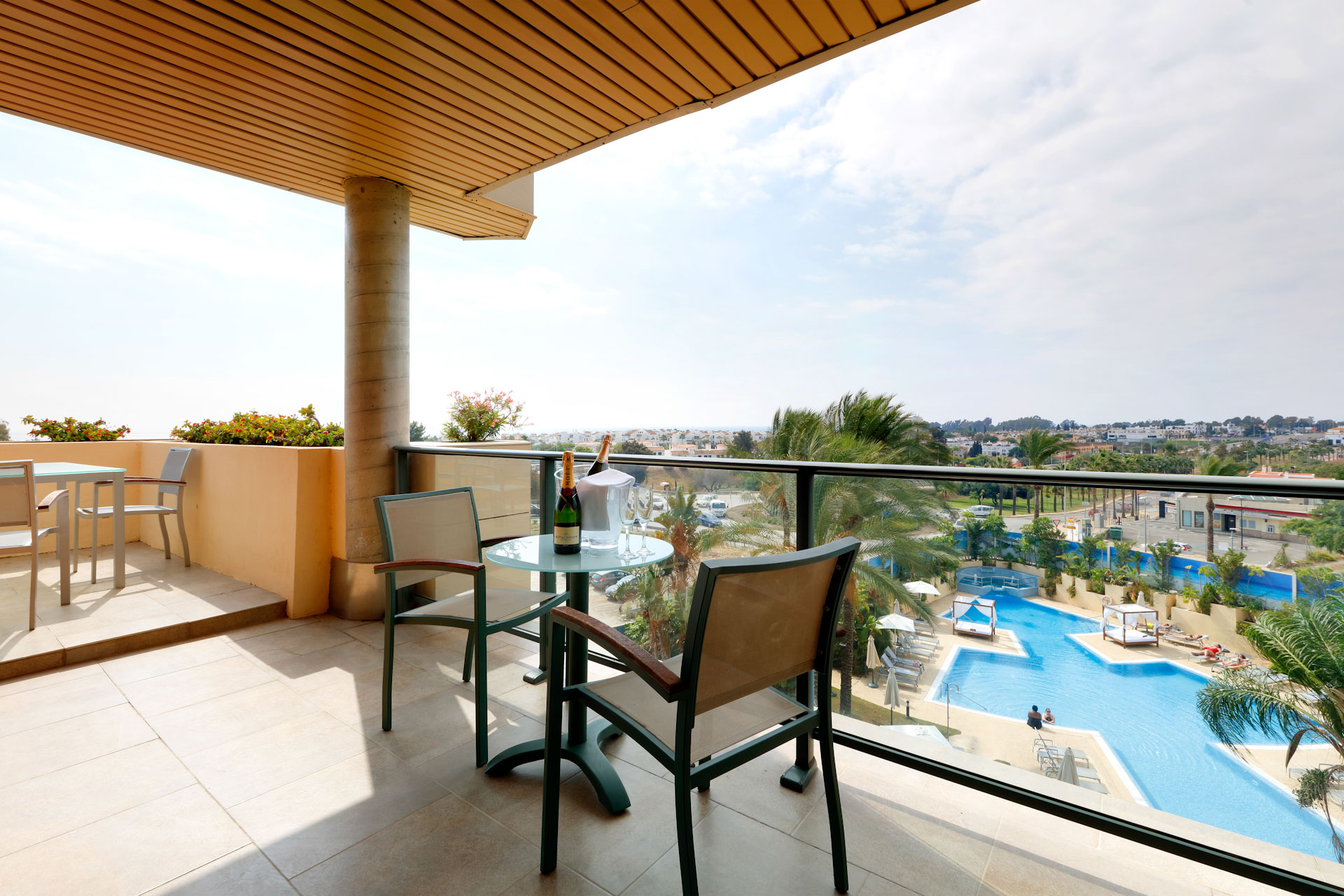 Drinks on the balcony at Hotel Exe Estepona, Costa del Sol, Spain