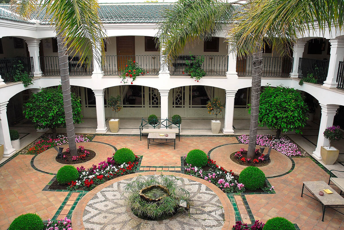 Interior courtyard at Los Monteros Spa & Golf Resort, near Marbella, Costa del Sol, Spain. Golf Planet Holidays
