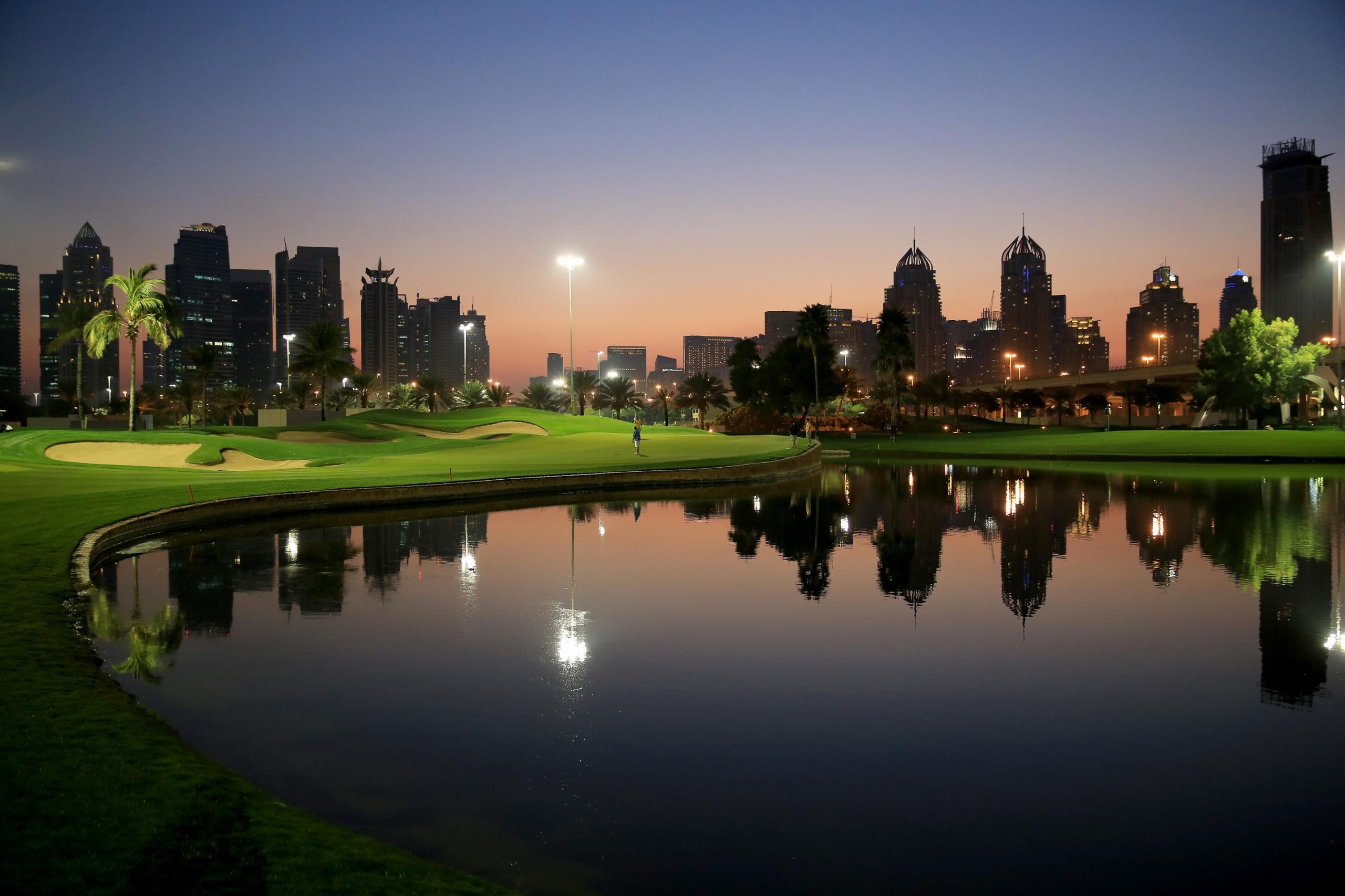 The Faldo golf course lit up at night at Emirates Golf Club, Dubai