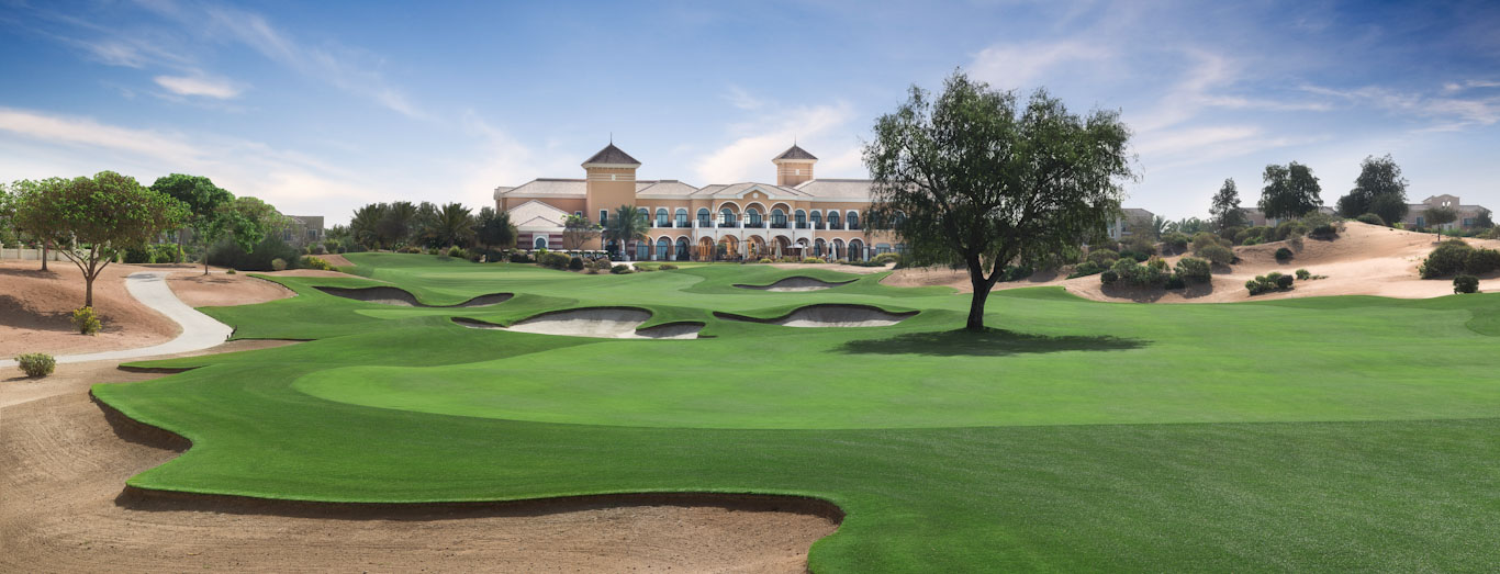 Playing towards the clubhouse at The Els Club, Dubai