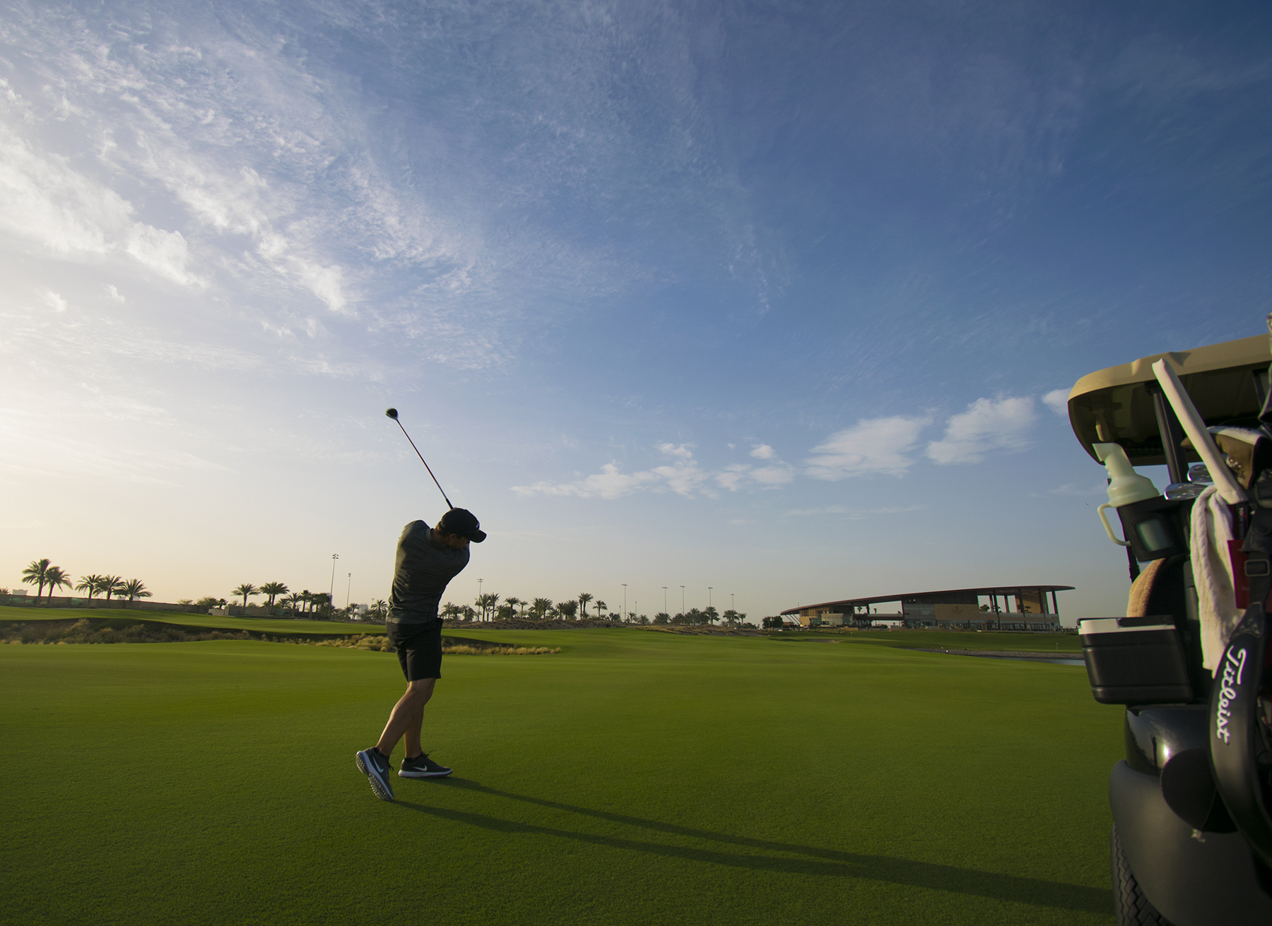 Playing towards the clubhouse at Trump International Golf Club, Dubai