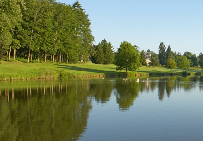 Reflections in the water at Tours Ardree Golf Club, Loire, France