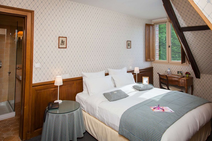 A double bedroom at Domaine de Roncemay Hotel, Auxerre, France