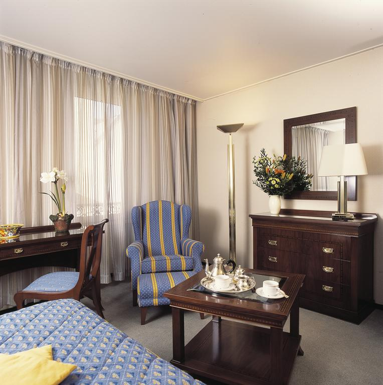 Colourful bedrooms at Grand Hotel de Solesmes, Loire, France