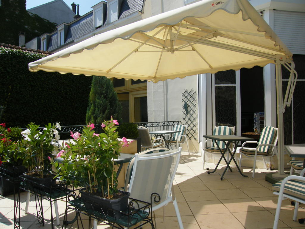 The terrace at Grand Hotel des Templiers, Reims, Champagne, France