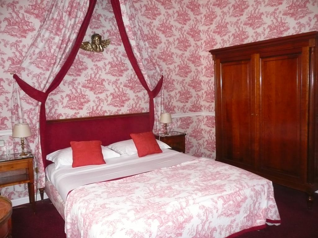 A double bedroom at Grand Hotel des Templiers, Reims, Champagne, France