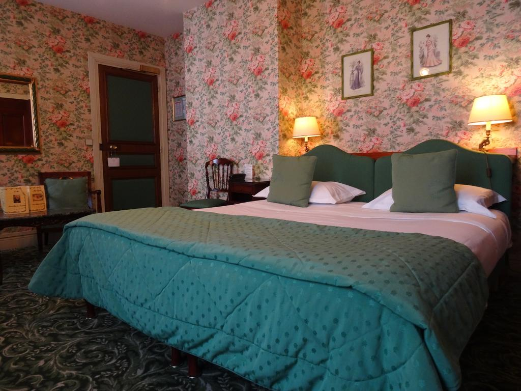 A double bedroom at Grand Hotel des Templiers, Reims, Champagne, France