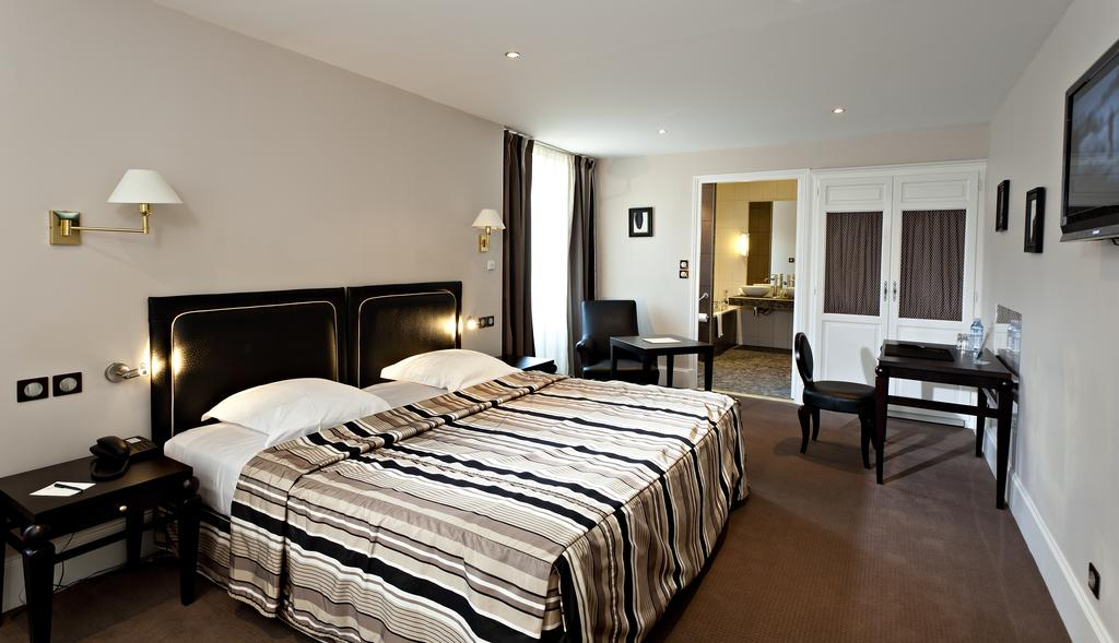 A bedroom at the Hotel de la Poste, Beaune, Burgundy, France