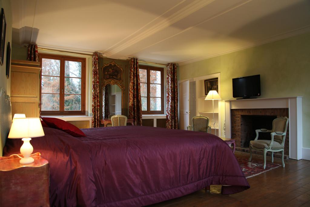 A double bedroom at Lâ€™Hostellerie du Chateau les Muids, La Ferte St Aubin, Loire, France