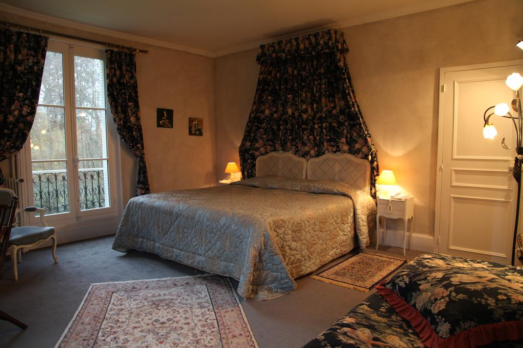 A double bedroom at Lâ€™Hostellerie du Chateau les Muids, La Ferte St Aubin, Loire, France