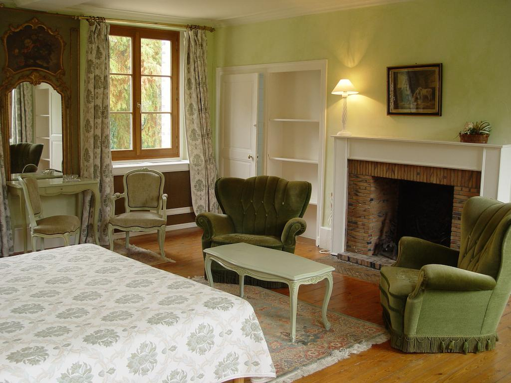 A double bedroom at Lâ€™Hostellerie du Chateau les Muids, La Ferte St Aubin, Loire, France