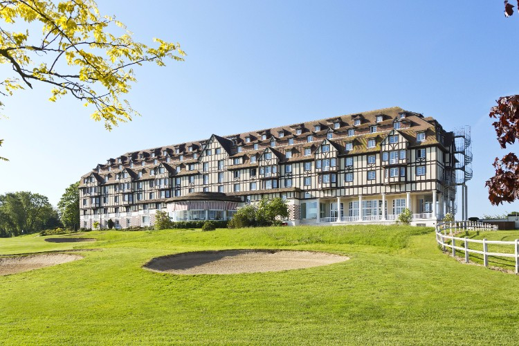 Heading to the 18th green on the red and white course at New Golf Deauville Golf Club, Normandy, France