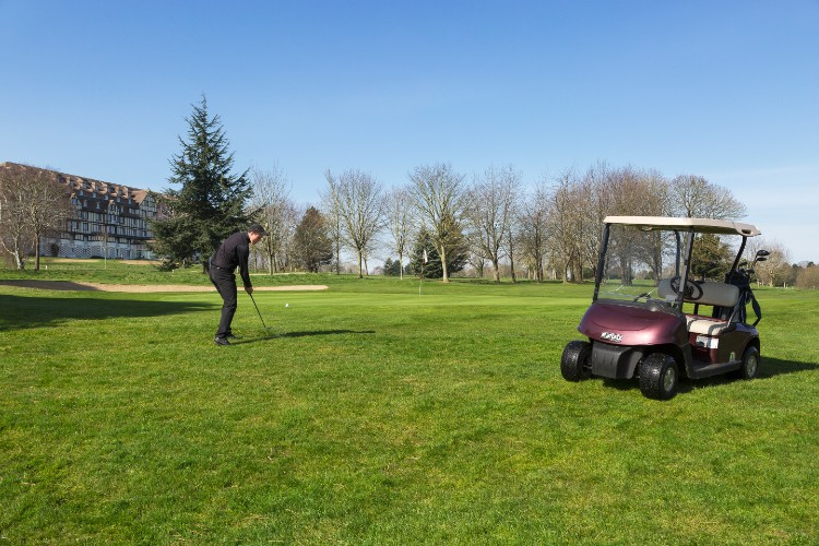 A wedge to the green at New Golf Deauville, Normandy, France