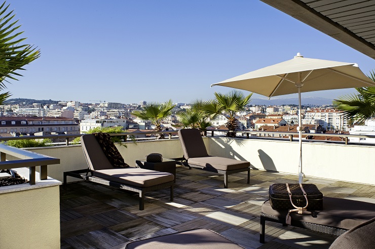 Terrace balcony at Le Gray d'Albion Hotel, Cannes, South of France. Golf Planet Holidays.