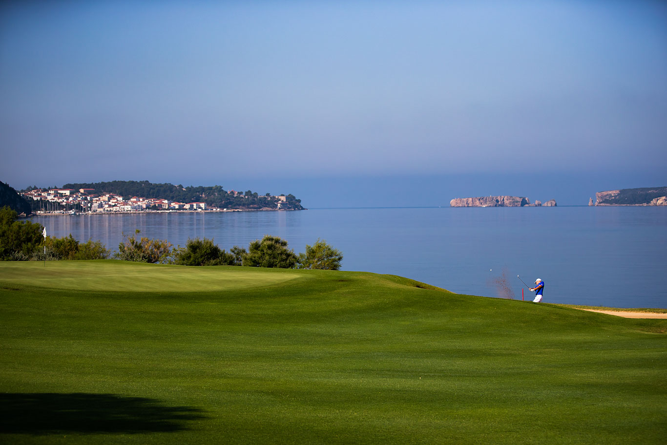 Playing golf right next to the sea on The Bay course, Costa Navarino, Greece