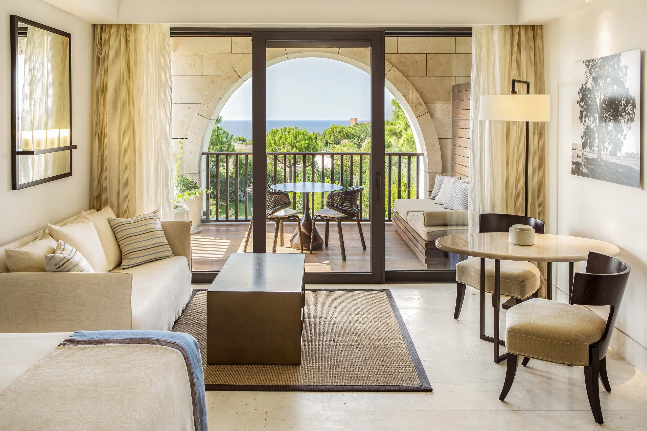 A luxury bedroom at The Romanos Costa Navarino, Greece, with seaview
