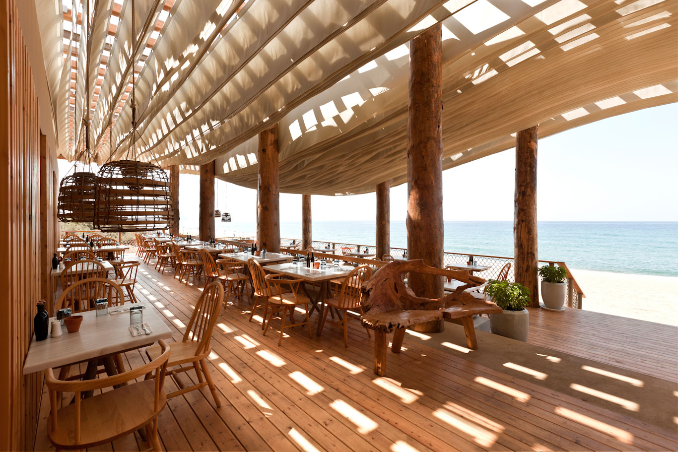 Dine on the beach at Costa Navarino, Greece