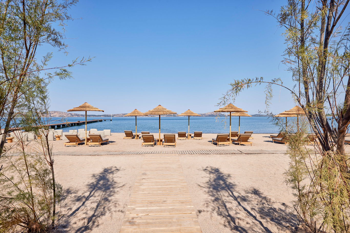 The beach at W Costa Navarino, Greece. Golf Planet Holidays.
