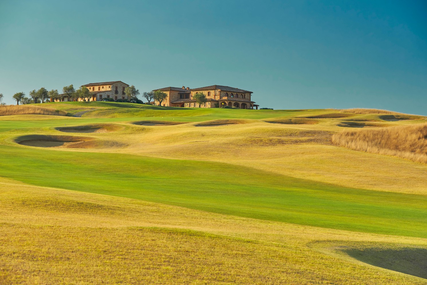 Looking from the La Bagnaia golf course up to the resort in Siena, Tuscany, Italy