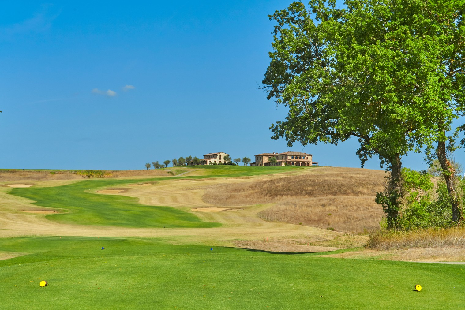 Ready to tee off towards the clubhouse at La Bagnaia Golf and Spa Resort, Siena, Tuscany, Italy