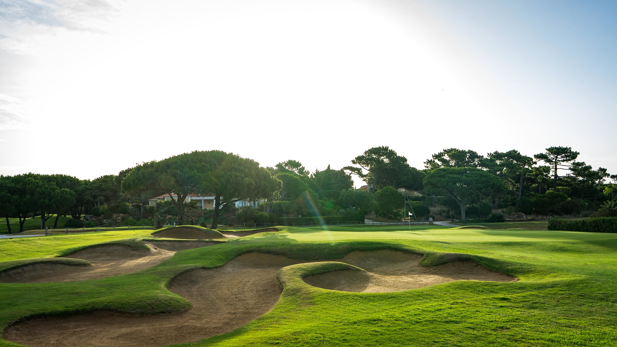 Bunkers surround this green at Quinta da Marinha Golf Course, Cascais, Portugal