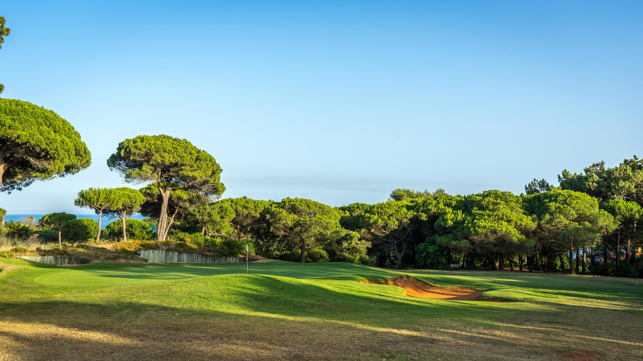 Shadows across the green at Quinta da Marinha Golf Course, Cascais, Portugal