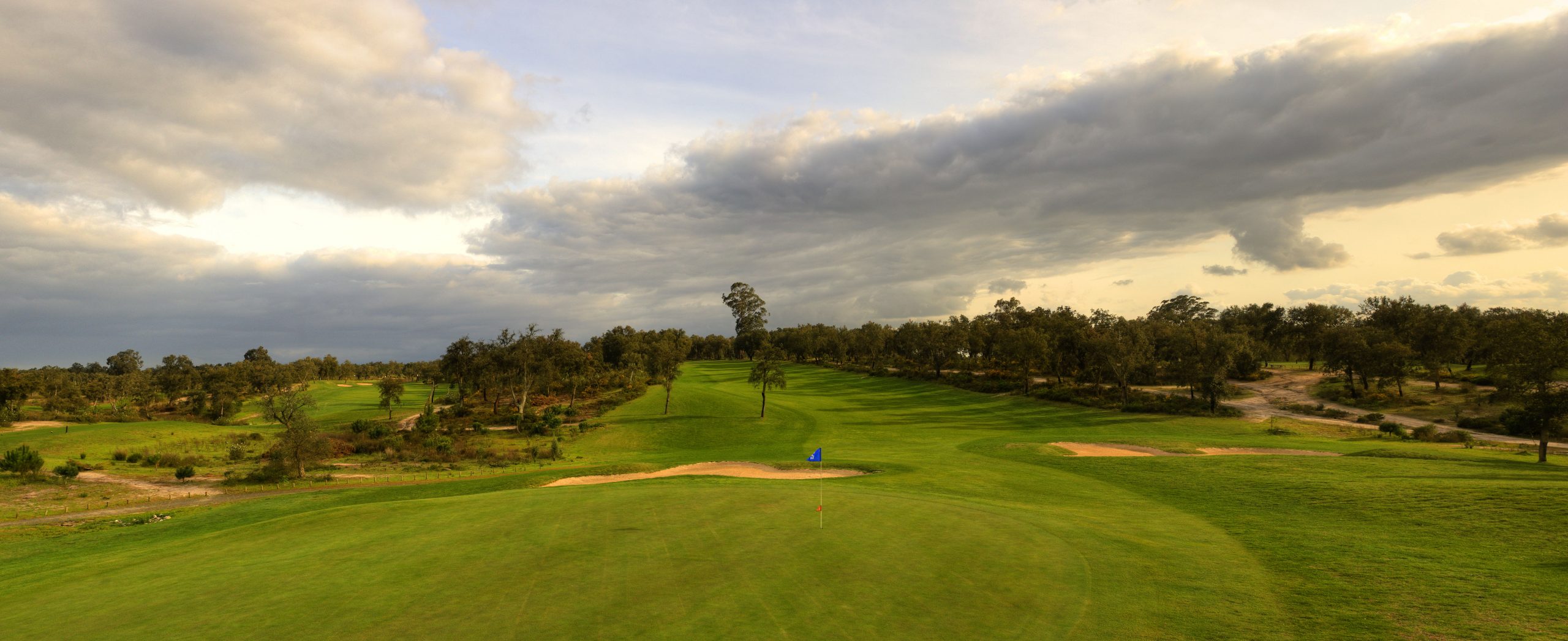 Clouds gather over Ribagolfe Golf Club, Lisbon, Portugal