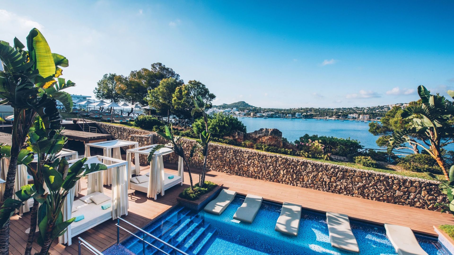 Relax by the pool at Iberostar Suite Hotel Jardin del Sol, Santa Ponsa, Mallorca