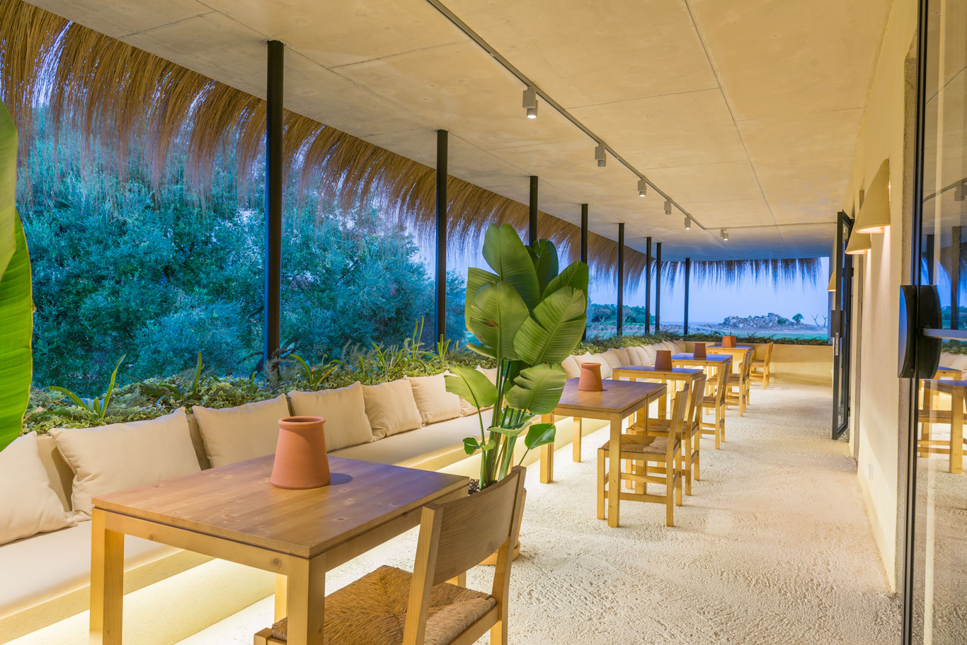 Enjoy a drink before dinner on the terrace at Pula Golf Resort, Son Servera, Mallorca