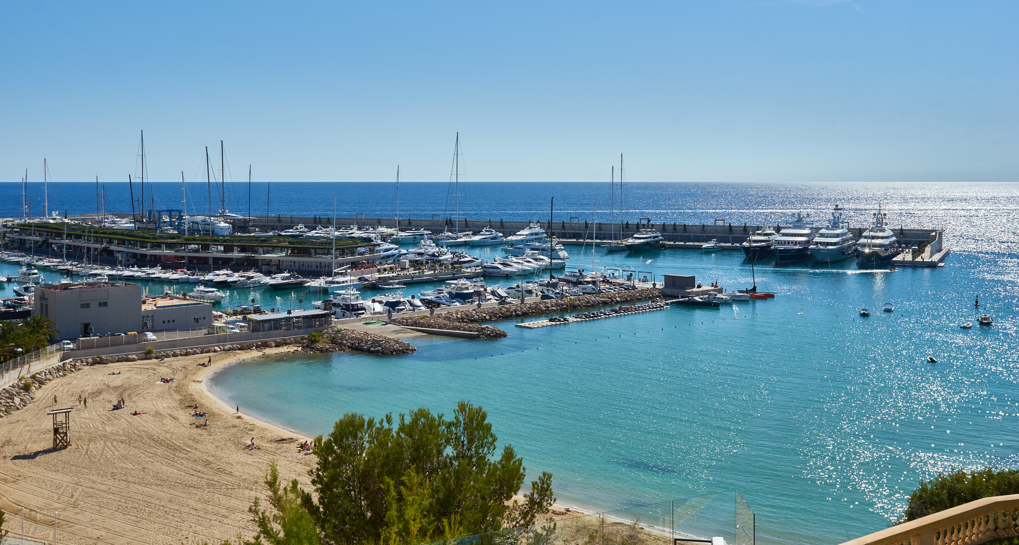 Large yachts dock at the quay next to Port Salt Port Adriano Calvia, Mallorca