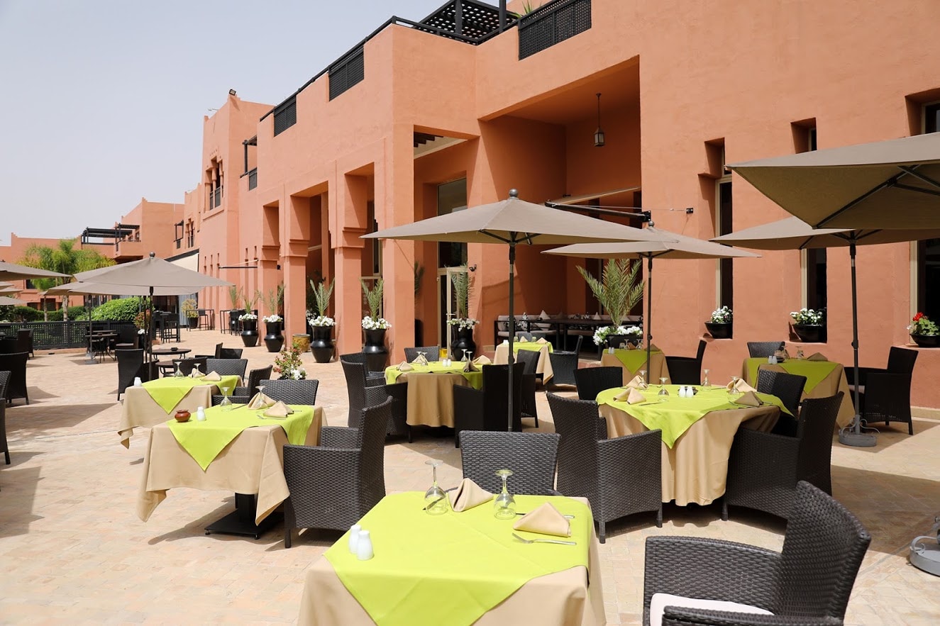 Outdoor dining at Kenzi Menara Palace, Marrakech, Morocco. Golf Planet Holidays