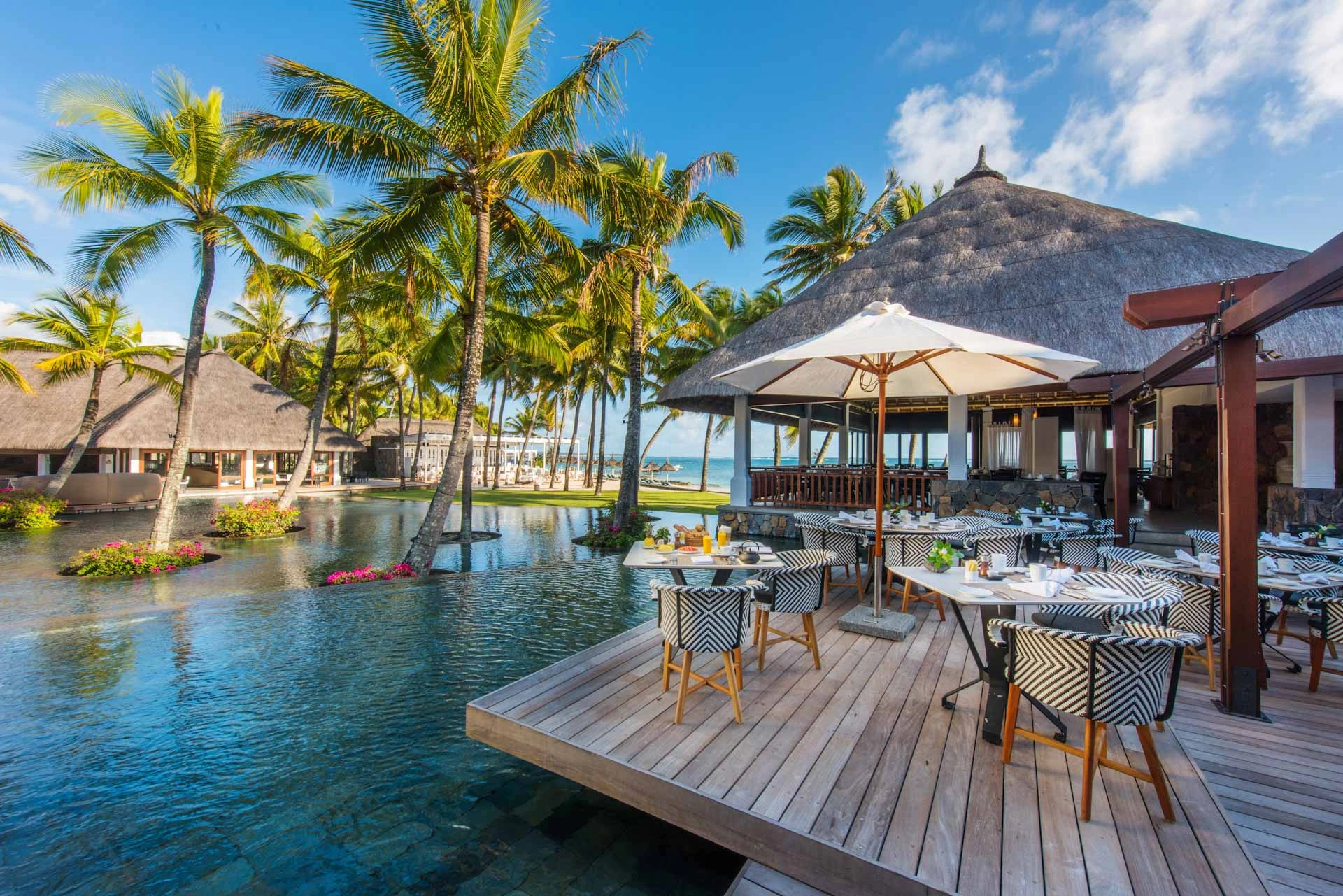 Dining with a view at Belle Mare Plage, Mauritius. Golf Planet Holidays