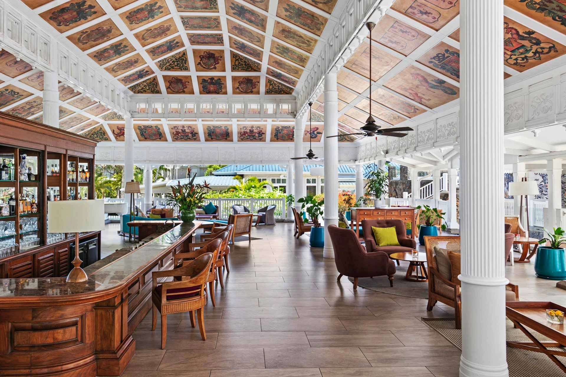 Relax in the bar at Heritage Le Telfair Golf and Wellness Resort, Mauritius. Golf Planet Holidays.