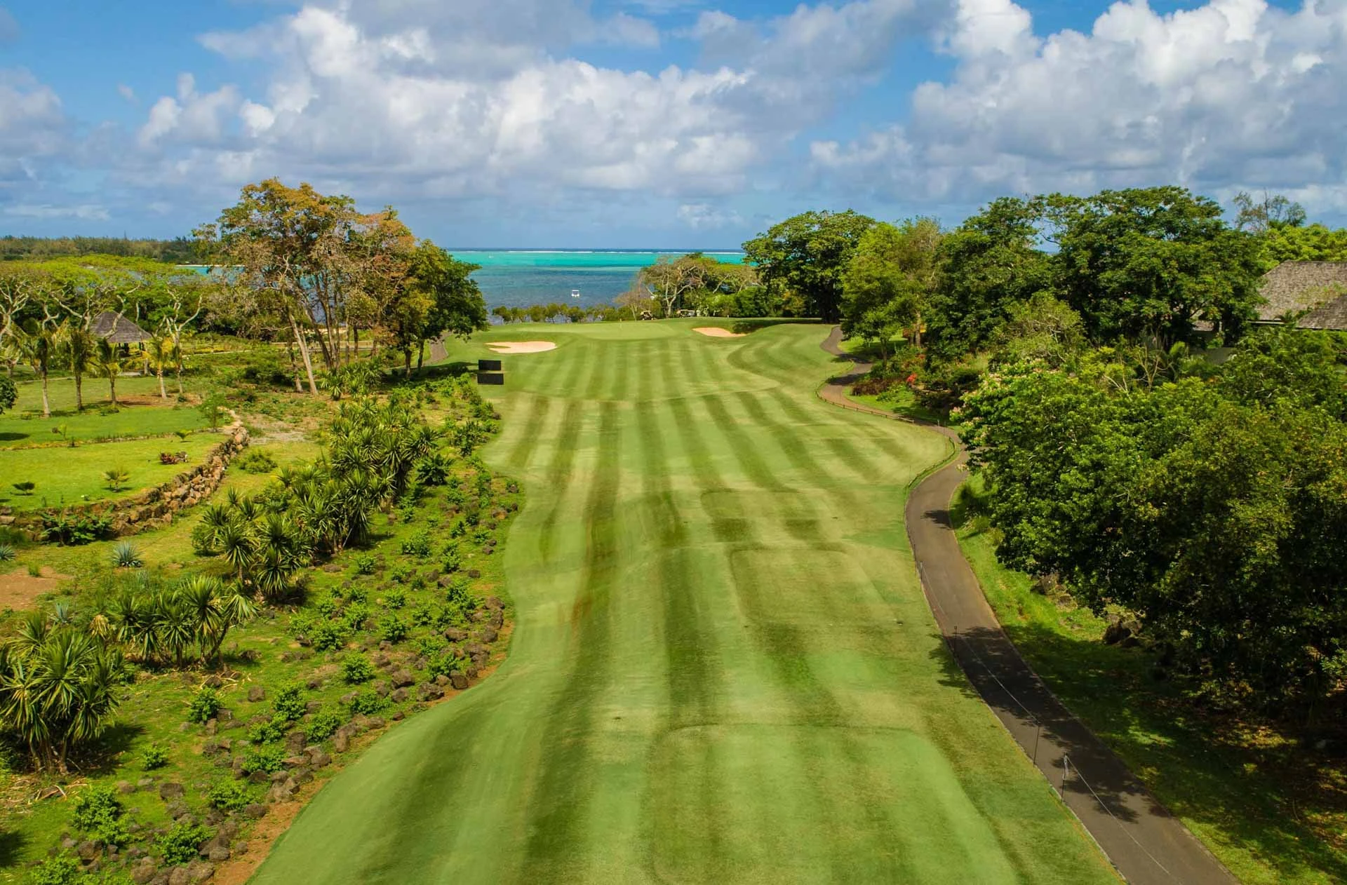 Fairway to the sea at Anahita Golf and Spa Resort, Mauritus. Golf Planet Holidays.