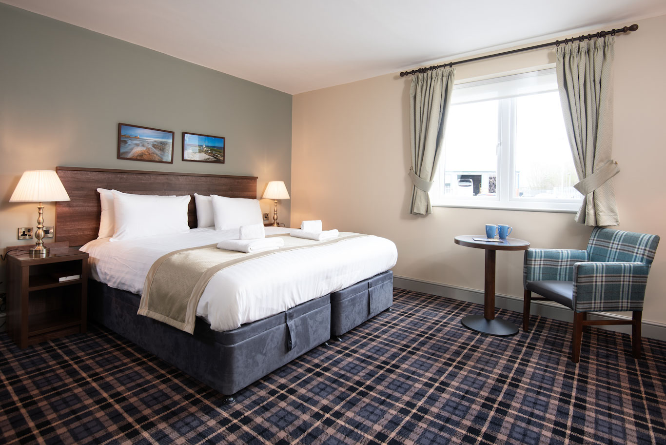 A comfortable bedroom at The Amble Inn, Amble, England