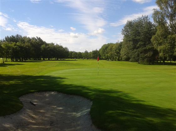 Shadows on the green at Howley Hall Golf Club, Yorkshire, England