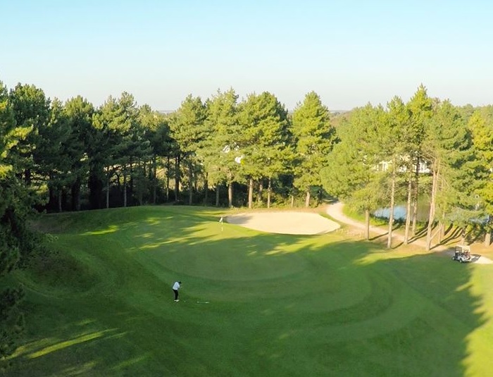 Chipping onto the green at Belle Dune golf club, Northern France